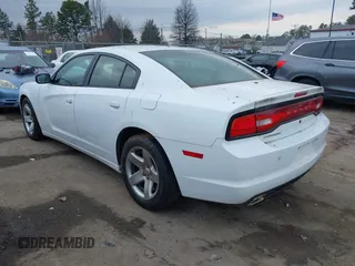 2013 Dodge Charger Police with VIN 2C3CDXAT8DH555397, listed as a IAAI auction lot 41487802 with 117,577 mi miles and . Bid and sale history available at DreamBid. Image 3.