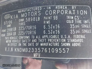 2007 Kia Sedona EX with VIN KNDMB233576109557, listed as a IAAI auction lot 41813984 with 204,856 mi miles. Bid and sale history available at carsss.com. Image 9.