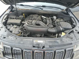 2018 Jeep Grand Cherokee Laredo E with VIN 1C4RJEAG4JC182430, listed as a Copart auction lot 50740255 with 117,944 mi miles and Salvage title. Bid and sale history available at DreamBid. Image 12.