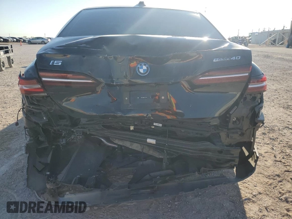 2024 BMW i5 eDrive40 with VIN WBY33FK05RCR36243, listed as a Copart auction lot 68999104 with 5,726 mi miles and Salvage Title. Bid and sale history available at carsss.com. Image 6.