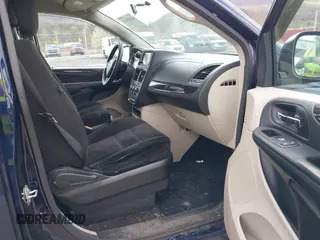 2016 Dodge Grand Caravan SE with VIN 2C4RDGBG4GR146450, listed as a IAAI auction lot 42015145 with 128,725 mi miles. Bid and sale history available at carsss.com. Image 5.