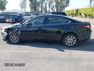 2016 Mazda 6 i Sport with VIN JM1GJ1U51G1445925, listed as a IAAI auction lot 41980386 with Not Provided miles and . Bid and sale history available at DreamBid. Image 13.