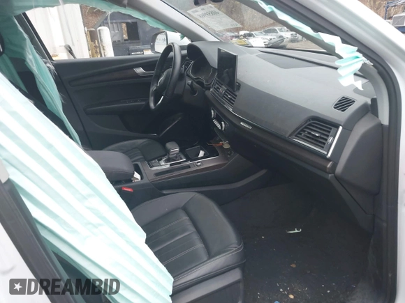2022 Audi Q5 S line Premium z VIN WA1GAAFY6N2119787, wystawiony jako IAAI lot #40859968 z przebiegiem 46 771 mil mil oraz . Historia ofert i sprzedaży dostępna na DreamBid. Obrazek 5.