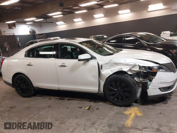 2013 Lincoln MKS с VIN 1LNHL9EK3DG615529, выставлен на аукционе IAAI как лот 42288732 с пробегом 135 876 миль миль и . История ставок и продаж доступна на DreamBid. Изображение 13.