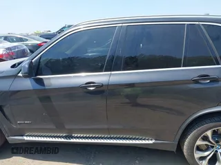 2016 BMW X5 xDrive35i z VIN 5UXKR0C51G0P22771, wystawiony jako IAAI lot #42161841 z przebiegiem 117 272 mil mil oraz . Historia ofert i sprzedaży dostępna na DreamBid. Obrazek 15.