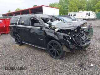 2018 Chevrolet Tahoe LT z VIN 1GNSCBKC2JR359681, wystawiony jako IAAI lot #42287525 z przebiegiem 144 568 mil mil oraz . Historia ofert i sprzedaży dostępna na DreamBid. Obrazek 1.