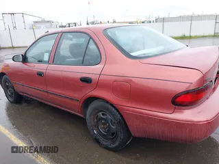 1997 Geo Prizm LSi with VIN 1Y1SK5265VZ457659, listed as a IAAI auction lot 41778510 with 149,073 mi miles. Bid and sale history available at carsss.com. Image 14.
