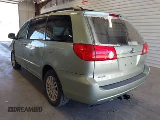 2008 Toyota Sienna LE with VIN 5TDBK23C88S020607, listed as a IAAI auction lot 41748033 with 159,439 mi miles and . Bid and sale history available at DreamBid. Image 3.