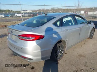 2018 Ford Fusion S with VIN 3FA6P0G73JR184463, listed as a IAAI auction lot 41763862 with 140,276 mi miles. Bid and sale history available at carsss.com. Image 4.