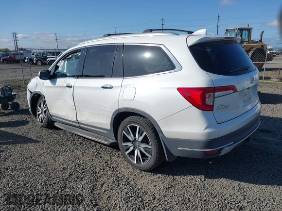 2021 Honda Pilot Touring 8-Passenger with VIN 5FNYF6H92MB031782, listed as a IAAI auction lot 42087322 with 70,062 mi miles and . Bid and sale history available at DreamBid. Image 3.