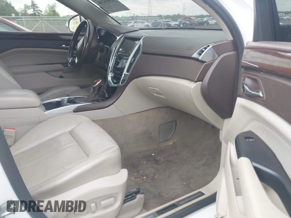 2014 Cadillac SRX Luxury Collection with VIN 3GYFNBE36ES519705, listed as a IAAI auction lot 42069288 with 211,632 mi miles and . Bid and sale history available at carsss.com. Image 5.