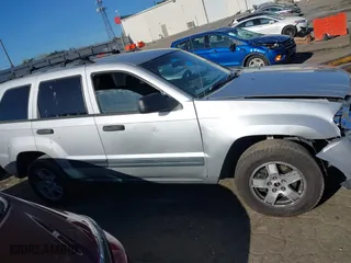2006 Jeep Grand Cherokee Laredo with VIN 1J4GR48K06C177358, listed as a IAAI auction lot 41861415 with 1 mi miles. Bid and sale history available at carsss.com. Image 12.
