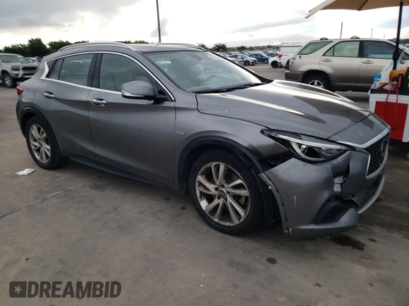 2019 Infiniti QX30 Luxe with VIN SJKCH5CP8KA009597, listed as a Copart auction lot 54388245 with 73,944 mi miles and Salvage title. Bid and sale history available at DreamBid. Image 4.