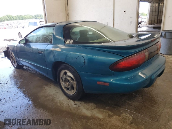 1995 Pontiac Firebird Firebird with VIN 2G2FS22S7S2240523, listed as a Copart auction lot 57970545 with 119,682 mi miles and Salvage title. Bid and sale history available at DreamBid. Image 2.
