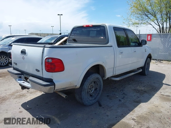 2003 Ford F-150 XLT with VIN 1FTRW08L23KD35077, listed as a IAAI auction lot 42071330 with 1 mi miles. Bid and sale history available at carsss.com. Image 4.