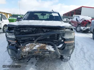 2018 Chevrolet Silverado 1500 LT with VIN 2GCVKREC6J1110953, listed as a IAAI auction lot 41352258 with 106,617 mi miles. Bid and sale history available at carsss.com. Image 6.