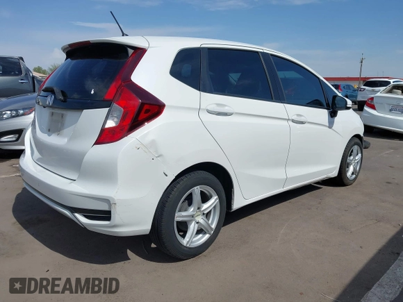 2019 Honda Fit LX with VIN 3HGGK5H49KM733792, listed as a IAAI auction lot 42597164 with 88,161 mi miles and . Bid and sale history available at DreamBid. Image 4.