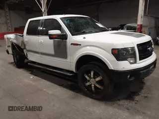 2013 Ford F-150 XL with VIN 1FTFW1ET7DFA81499, listed as a IAAI auction lot 41302118 with 153,976 mi miles. Bid and sale history available at carsss.com. Image 1.