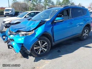 2018 Toyota RAV4 XLE with VIN JTMWFREV7JJ730968, listed as a IAAI auction lot 41778761 with 122,102 mi miles. Bid and sale history available at carsss.com. Image 2.