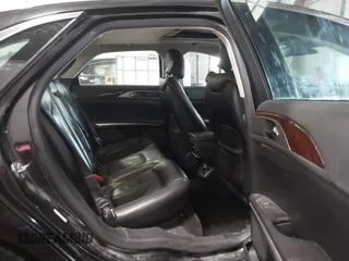 2013 Lincoln MKZ Hybrid z VIN 3LN6L2LU8DR818010, wystawiony jako IAAI lot #41363777 z przebiegiem 181 675 mil mil oraz . Historia ofert i sprzedaży dostępna na DreamBid. Obrazek 8.