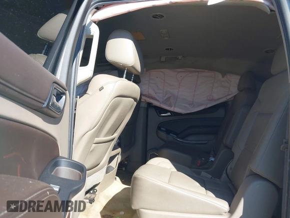 2015 Chevrolet Suburban LT z VIN 1GNSCJKC1FR608117, wystawiony jako IAAI lot #41641560 z przebiegiem 163 770 mil mil oraz . Historia ofert i sprzedaży dostępna na DreamBid. Obrazek 8.