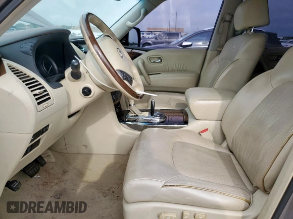 2014 Infiniti QX80 z VIN JN8AZ2NFXE9554446, wystawiony jako Copart lot #59659885 z przebiegiem 240 055 mil mil oraz Czysty tytuł • Clean title. Historia ofert i sprzedaży dostępna na DreamBid. Obrazek 7.
