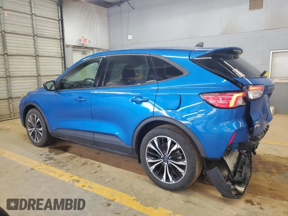 2021 Ford Escape SE with VIN 1FMCU0G61MUB00873, listed as a Copart auction lot 60718995 with 96,502 mi miles and Salvage title. Bid and sale history available at DreamBid. Image 2.