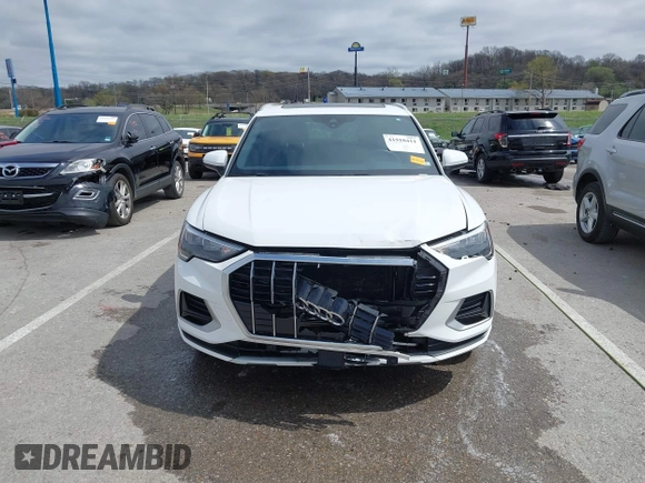 2021 Audi Q3 Premium with VIN WA1AUCF33M1096437, listed as a IAAI auction lot 41910411 with 86,837 mi miles and . Bid and sale history available at DreamBid. Image 13.