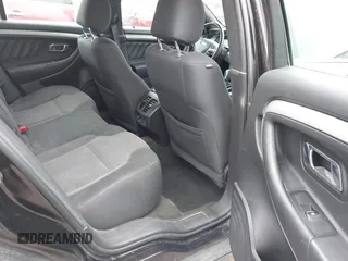 2014 Ford Taurus SEL z VIN 1FAHP2E85EG121636, wystawiony jako IAAI lot #41036886 z przebiegiem 117 460 mil mil oraz . Historia ofert i sprzedaży dostępna na DreamBid. Obrazek 8.