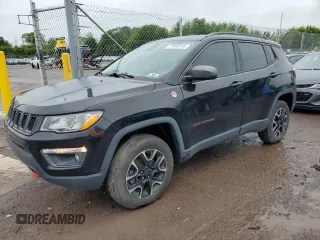 2020 Jeep Compass Trailhawk with VIN 3C4NJDDB6LT127557, listed as a Copart auction lot 57888245 with 113,836 mi miles and Salvage title. Bid and sale history available at DreamBid. Image 1.