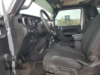 2022 Jeep Wrangler Sport with VIN 1C4HJXAG8NW181325, listed as a Copart auction lot 82700694 with 27,763 mi miles and Salvage Title. Bid and sale history available at DreamBid. Image 7.