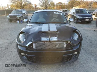 2013 MINI Coupe S z VIN WMWSX3C53DT466665, wystawiony jako Copart lot #79497824 z przebiegiem 94 767 mil mil oraz Szkody całkowita. Historia ofert i sprzedaży dostępna na DreamBid. Obrazek 5.