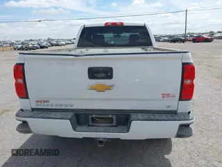 2018 Chevrolet Silverado 1500 LT with VIN 1GCUKREC5JF133998, listed as a IAAI auction lot 41880805 with 166,258 mi miles and . Bid and sale history available at DreamBid. Image 16.
