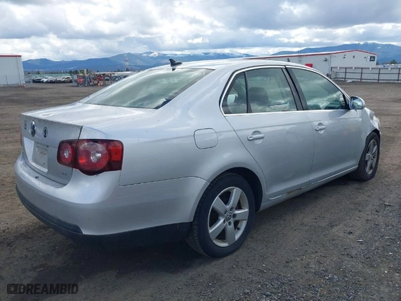 2009 Volkswagen Jetta Sedan SE with VIN 3VWRZ71K39M090645, listed as a IAAI auction lot 41999413 with 244,687 mi miles. Bid and sale history available at carsss.com. Image 4.