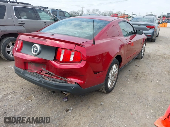 2012 Ford Mustang V6 Premium with VIN 1ZVBP8AM6C5262808, listed as a IAAI auction lot 41907866 with 121,630 mi miles. Bid and sale history available at carsss.com. Image 4.