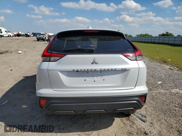 2023 Mitsubishi Eclipse Cross ES z VIN JA4ATUAA3PZ050854, wystawiony jako Copart lot #56412925 z przebiegiem 24 322 mil mil oraz Szkoda całkowita • Salvage title. Historia ofert i sprzedaży dostępna na DreamBid. Obrazek 6.