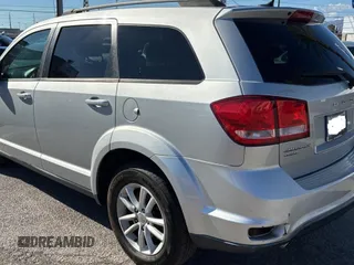 2013 Dodge Journey SXT with VIN 3C4PDDBG4DT593312, listed as a Copart auction lot 56431775 with 131,651 mi miles and Clean Title. Bid and sale history available at DreamBid. Image 3.