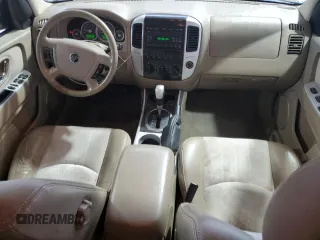 2005 Mercury Mariner Luxury z VIN 4M2YU561X5DJ04364, wystawiony jako Copart lot #44622345 z przebiegiem 265 744 mil mil oraz Szkody całkowita. Historia ofert i sprzedaży dostępna na DreamBid. Obrazek 8.