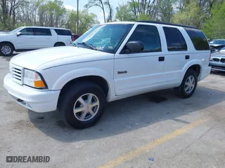 2001 Oldsmobile Bravada with VIN 1GHDT13W612113305, listed as a IAAI auction lot 42007883 with 117,627 mi miles. Bid and sale history available at carsss.com. Image 2.
