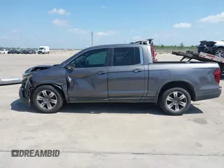 2019 Honda Ridgeline RTL with VIN 5FPYK2F59KB004653, listed as a IAAI auction lot 42066778 with 90,144 mi miles and . Bid and sale history available at DreamBid. Image 14.