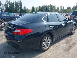 2012 Infiniti M with VIN JN1BY1AR4CM396129, listed as a IAAI auction lot 42555601 with 131,852 mi miles and . Bid and sale history available at DreamBid. Image 4.