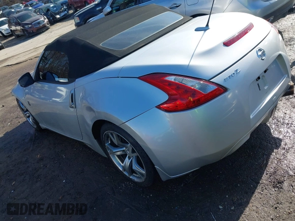 2012 Nissan 370Z Touring with VIN JN1AZ4FH4CM371189, listed as a IAAI auction lot 41088025 with 74,076 mi miles. Bid and sale history available at carsss.com. Image 3.