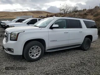 2016 GMC Yukon XL SLE z VIN 1GKS2FEC6GR281305, wystawiony jako Copart lot #83847964 z przebiegiem 33 282 mil mil oraz Szkoda całkowita • Salvage title. Historia ofert i sprzedaży dostępna na DreamBid. Obrazek 1.