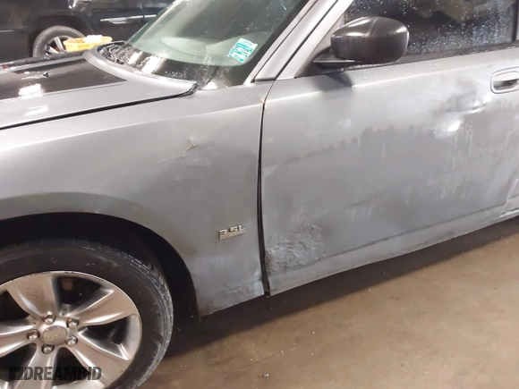 2006 Dodge Charger with VIN 2B3KA43G96H260361, listed as a IAAI auction lot 41907467 with 157,231 mi miles. Bid and sale history available at carsss.com. Image 15.