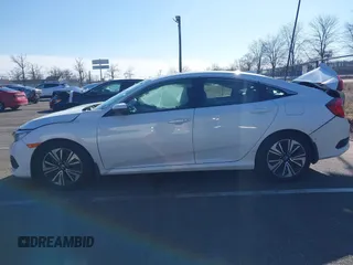 2017 Honda Civic Sedan EX-L with VIN 2HGFC1F70HH651956, listed as a IAAI auction lot 41754511 with 129,385 mi miles. Bid and sale history available at carsss.com. Image 14.