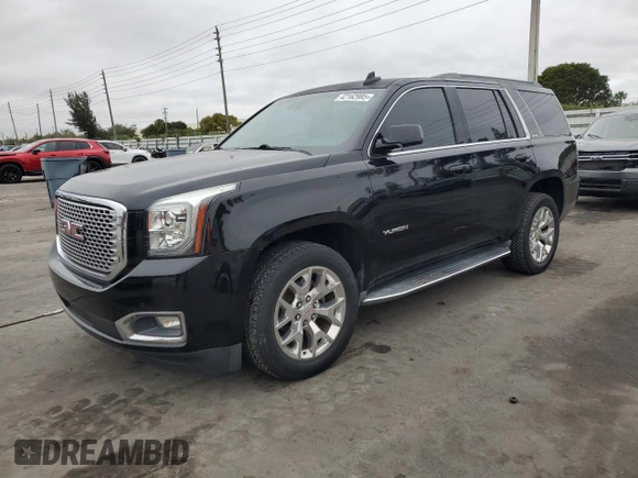 2015 GMC Yukon SLE with VIN 1GKS1AKC0FR684558, listed as a Copart auction lot 42162985 with 156,302 mi miles and Clean Title. Bid and sale history available at carsss.com. Image 1.