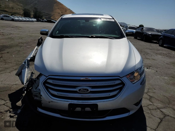 2015 Ford Taurus Limited с VIN 1FAHP2F84FG106058, выставлен на аукционе Copart как лот 57621355 с пробегом 130 582 миль миль и Списание • Salvage title. История ставок и продаж доступна на DreamBid. Изображение 5.