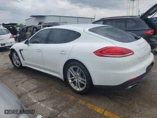 2016 Porsche Panamera 4 with VIN WP0AA2A76GL000019, listed as a Copart auction lot 56051234 with 86,889 mi miles and Salvage Title. Bid and sale history available at carsss.com. Image 2.