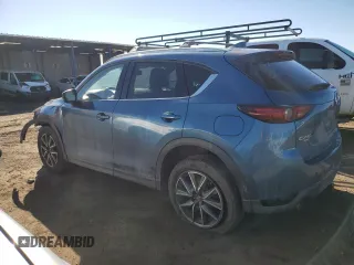 2018 Mazda CX-5 Grand Touring with VIN JM3KFBDM9J0323388, listed as a Copart auction lot 47628135 with 102,098 mi miles and Salvage Title. Bid and sale history available at carsss.com. Image 2.