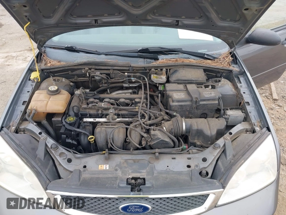 2007 Ford Focus S z VIN 1FAFP37N07W343784, wystawiony jako IAAI lot #42036642 z przebiegiem 223 104 mil mil oraz . Historia ofert i sprzedaży dostępna na DreamBid. Obrazek 10.